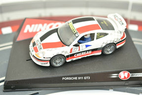 Slot car of a white and red Porsche 911 GT3 race car for Ninco 50227