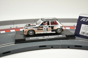 Model car of a 1984 Renault 5 Turbo rally car on a track base for Fly Car 88202