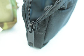 Black zippered wallet with visible zipper pull for While The Cigars Lit WTCL001