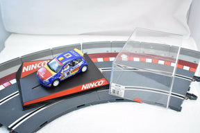 Slot car on track set with clear barrier for NINCO 50336