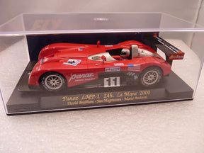 Red race car model, Panoz LMP-1, displayed in a clear case for Fly Car A95