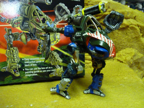 Action figure of a robot character with green and red accents for Robogear 6002