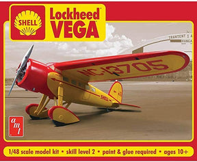 Red and yellow Lockheed Vega model kit on a tarmac for AMT 950
