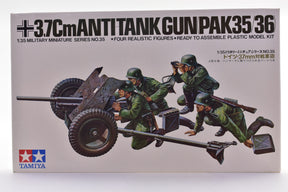 Model kit box art showing 3.7cm anti-tank gun and four soldiers in action for Tamiya MM147