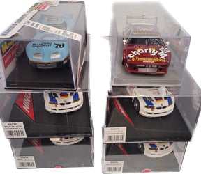 die-cast cars in clear display cases: BMW, Chevrolet, and other models for JKLT1