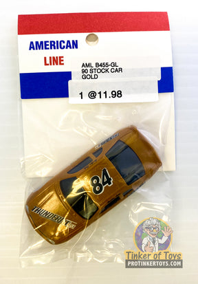 Gold 90 stock car toy with number 84, packaged with American Line card for B455