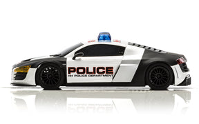 Black and white police car model with flashing blue lights for Scalextric C3932