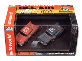 Two slot cars, a red '59 and a blue '51, displayed in a box for Auto World CP7822