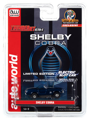 Blue and white Shelby Cobra electric slot car toy packaging for Auto World CP7827