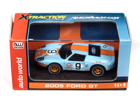 Blue and orange 2005 Ford GT race car model in its box for Auto World