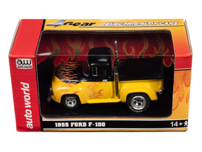 Black and yellow flame-themed 1955 Ford F-100 toy car in its box for Auto World