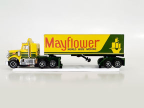 Yellow and green toy semi-truck with "Mayflower World Wide Moving" on the trailer for Auto World CP7984, front view