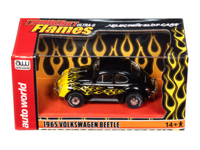 Black 1965 VW Beetle toy car with yellow flames, displayed in its box for Auto World CP7985
