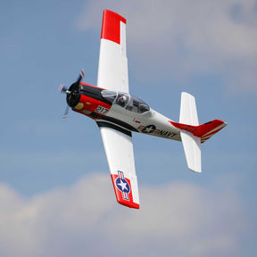 Red and white T-28 Trojan model airplane flying against a blue sky for E-flite EFL18350