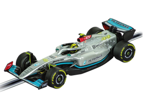 Silver F1 race car model, Mercedes GP livery, on a black background for Carrera 20064204