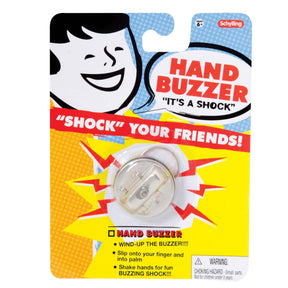 Hand buzzer toy packaging showing a smiling face and the product name for Schylling HBZ