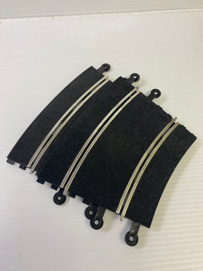 Black track sections with metal rails for model train layout for SCX or Scalextric 84020