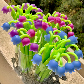 Colorful, flower-shaped gel pens arranged in clear holders for BCmini 22413