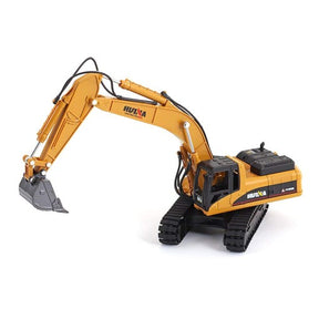 Yellow diecast metal excavator model with articulated arm and tracks for Imex Model Co IMX14500