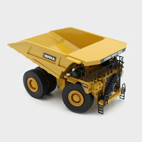 Yellow diecast mining dump truck model with large wheels and detailed chassis for Imex Model Co IMX14506
