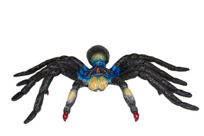 Large, dark tarantula toy with blue and yellow accents for Mamejo MAJ22216