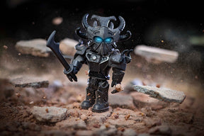 Dark, menacing robot figure with glowing blue eyes stands amidst scattered debris for UCC 10792
