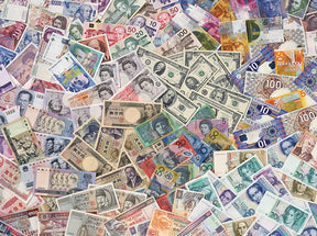 Assortment of colorful, overlapping paper currency notes for a puzzle for PuzzleLife PLF698