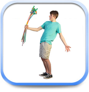Boy holding colorful candy art sticks, demonstrating the fun of Pucker Power for Creative Concepts CPPFTASM