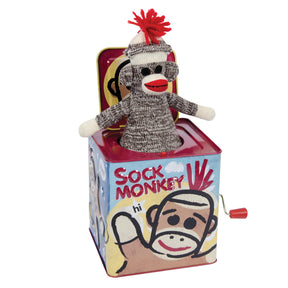 Stuffed monkey toy emerging from a red and blue box for Schylling SMJB