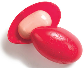 Two pink and red Silly Putty toys, one nestled in a red mold