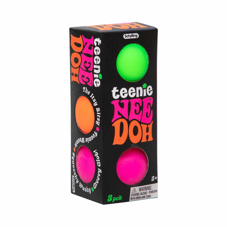 Three-pack of colorful, squishy sensory toys in a black box for Schylling TND