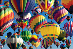 Colorful hot air balloons floating against a bright blue sky for Tomax TOM100-269