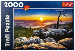 Sunrise over mountains from rocky foreground for Trefl TRF27059