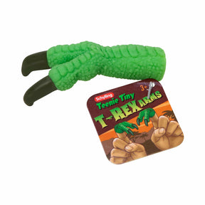 Green toy t-rex arms with card showing product details for Schylling TTA
