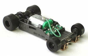 Remote-controlled car chassis with four wheels and visible electronics for AFX/Racemasters 21023