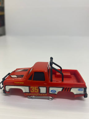 Red toy truck with "GOOD YEAR" and "TURBO" decals for Aurora / AFX / Tomy B1971