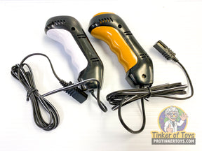 Two black and yellow RC hand throttles with attached wires for Auto World TRX400
