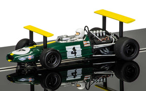 Green race car model with yellow wings, featuring a driver figure for Scalextric C3702A