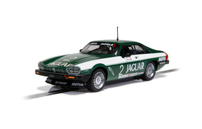 Green and white Jaguar XJS model car on a track for Scalextric C4254