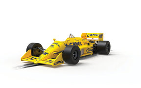 Yellow race car model, Lotus 99T, from the 1987 Monaco GP for Scalextric C4355