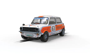 Miniature model car, white and orange, representing a 1979 Data Post race car for Scalextric C4413