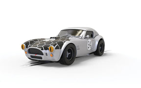 Silver Shelby Cobra replica with black "snake eyes" detailing for Scalextric C4417