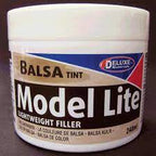 White container of Model Lite Balsa Filler, a lightweight filler material for Deluxe DLMBD5