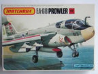 Scale model of an EA-6B Prowler aircraft in flight over water for Matchbox