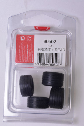 Four black slot car tires for 1/32 scale models for NINCO Slot Cars 80502
