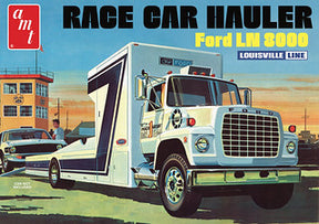 White and blue Ford race car hauler model kit box art for AMT AMT1316