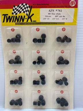 Assortment of black silicone tires and hubs for RC vehicles for AJ Inc 782