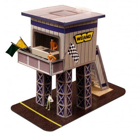 Model kit of a marshalling tower with figures and checkered flag for Innovative Hobby Supply BK6429