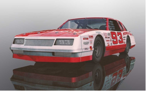 Red and white slot car of a classic Chevrolet Monte Carlo race car for Scalextric C3949