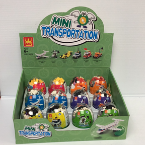 Assortment of mini vehicle toys in a green cardboard display box for IMEX Model Company WAG65016